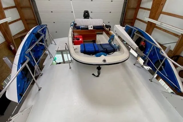 Slide: The Image of 1977 Uniflite 42 Convertible boat interior with blue accents and equipment. - 3