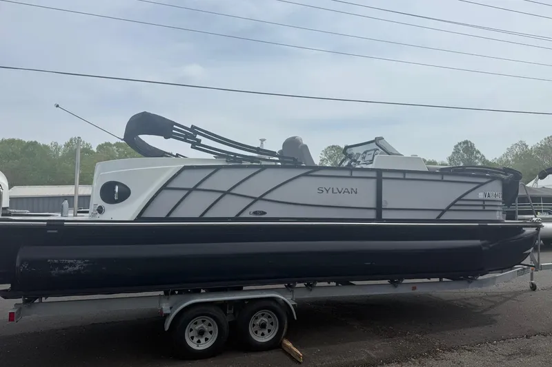 The Image of 2020 Sylvan S3 CRS pontoon boat on trailer, side view. - 0