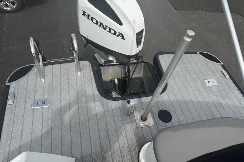 Slide: The Image of 2020 Sylvan S3 CRS boat with Honda outboard motor on deck. - 10