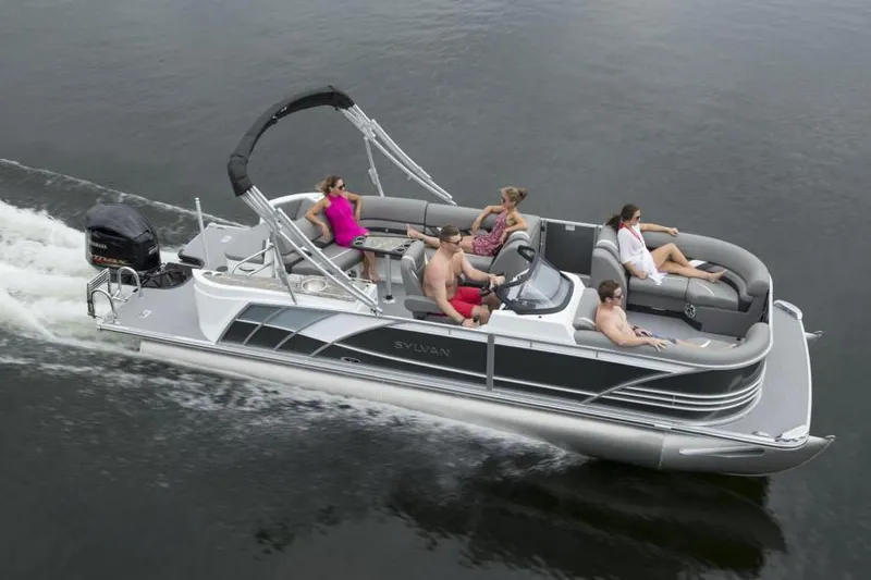 Slide: The Image of Manufacturer Provided Image: 2020 Sylvan S3 CRS pontoon boat cruising with passengers on a lake. - 14