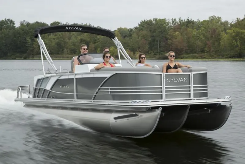Slide: The Image of Manufacturer Provided Image: 2020 Sylvan S3 CRS pontoon boat cruising on a lake with passengers. - 15