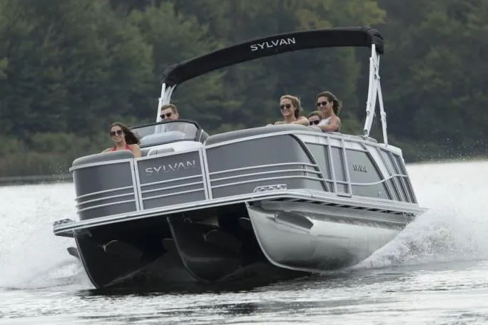 Slide: The Image of Manufacturer Provided Image: 2020 Sylvan S3 CRS pontoon boat cruising on a lake with passengers. - 17