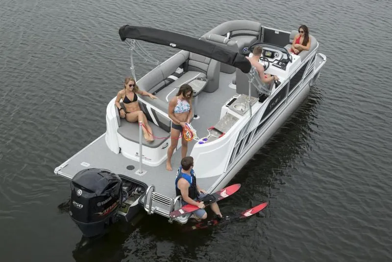 Slide: The Image of Manufacturer Provided Image: 2020 Sylvan S3 CRS pontoon boat with people enjoying water activities. - 19