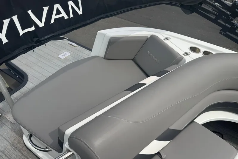 Slide: The Image of 2020 Sylvan S3 CRS boat interior with gray seating and cup holders. - 6