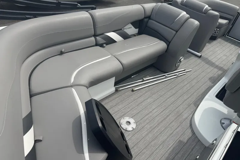 Slide: The Image of 2020 Sylvan S3 CRS boat interior with gray seating and flooring. - 9