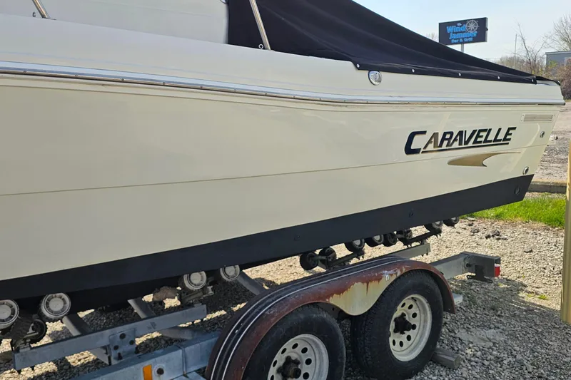 Slide: The Image of 2003 Caravelle 230 Walk Around Stern Drive boat on trailer, side view. - 6