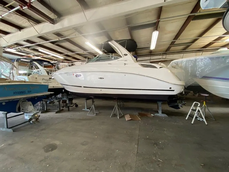 The Image of 2013 Sea Ray Sundancer 260 in a storage facility. - 0