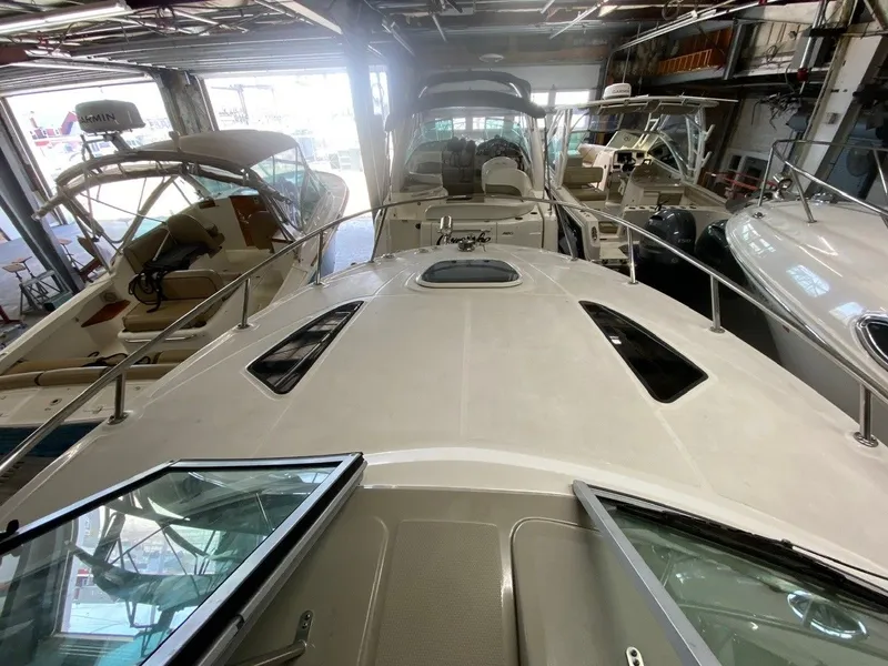 Slide: The Image of 2013 Sea Ray Sundancer 260 in a boatyard. - 5