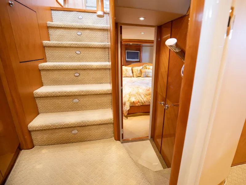 Slide: The Image of Interior of Cheoy Lee 68 Motor Yacht, stairs and bedroom view. - 29
