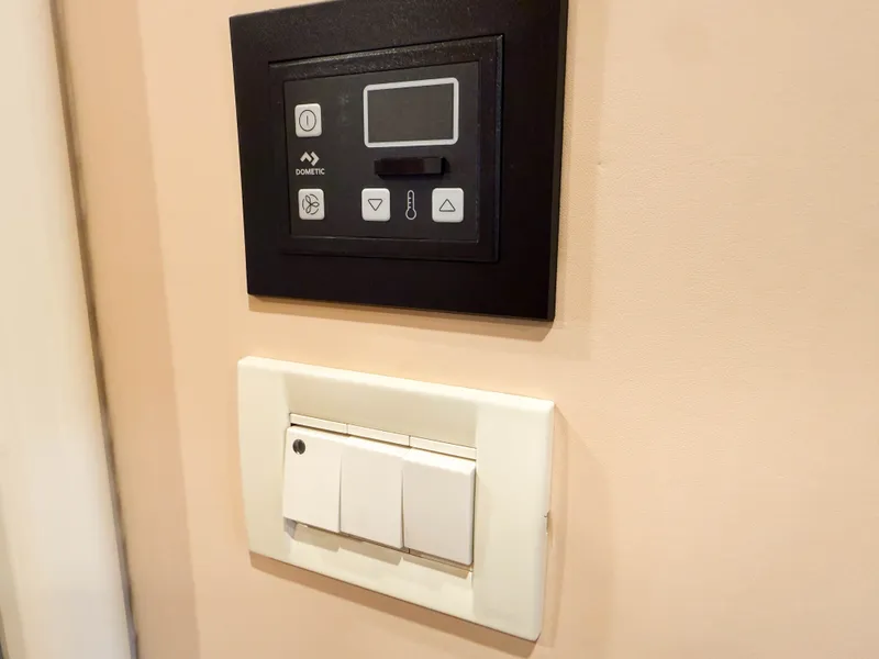 Slide: The Image of Control panel and light switch on Cheoy Lee 68 Motor Yacht, 2004 model. - 43