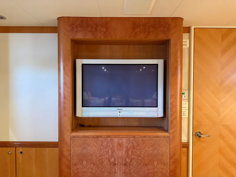 Slide: The Image of Wood-paneled TV on 2004 Cheoy Lee 68 Motor Yacht. - 48