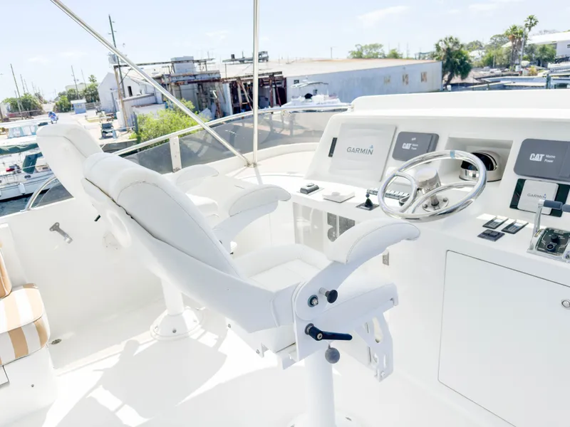 Slide: The Image of Helm of 2004 Cheoy Lee 68 Motor Yacht featuring modern electronics. - 6