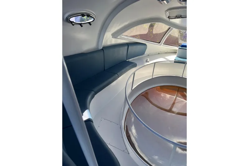 Slide: The Image of Interior of 2020 Paritetboat Looker with sleek seating and large viewing window. - 12