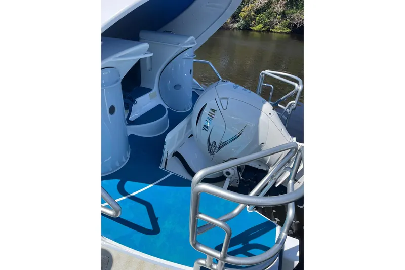 Slide: The Image of 2020 Paritetboat Looker with Yamaha engine, featuring sleek interior design and railing. - 14