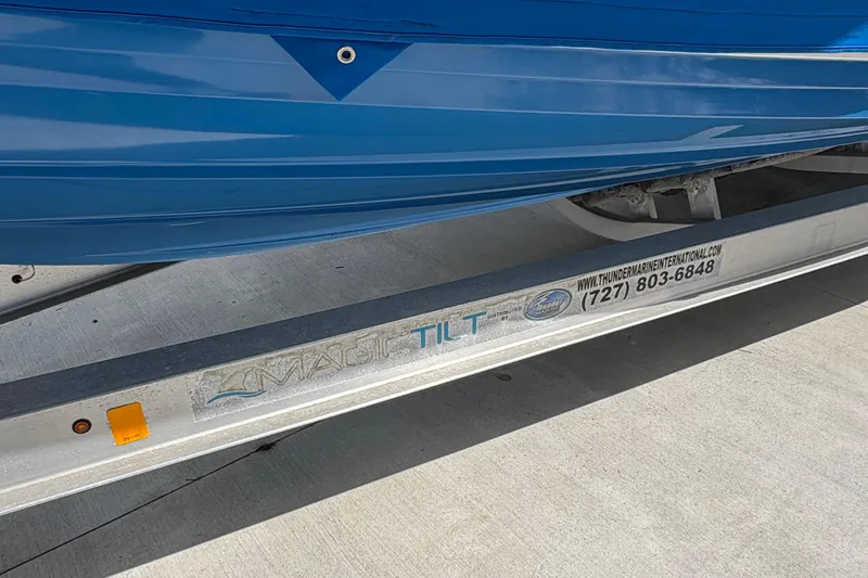 Slide: The Image of Blue Wave 2800 Pure Hybrid boat on Magic Tilt trailer, 2019 model. - 22