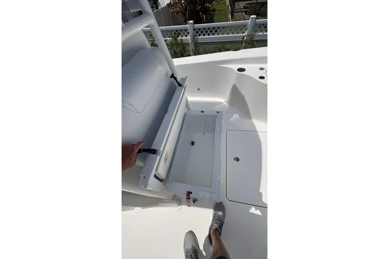 Slide: The Image of 2019 Blue Wave 2800 Pure Hybrid boat with open storage compartment. - 37