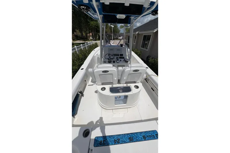 Slide: The Image of 2019 Blue Wave 2800 Pure Hybrid boat interior with seating and control console. - 42