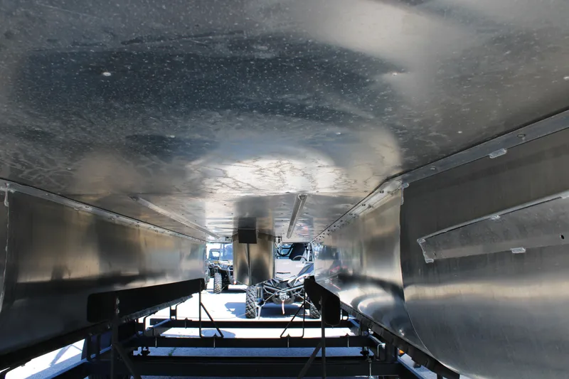 Slide: The Image of Underneath view of 2025 SunCatcher Select 20FC pontoon boat on trailer. - 18