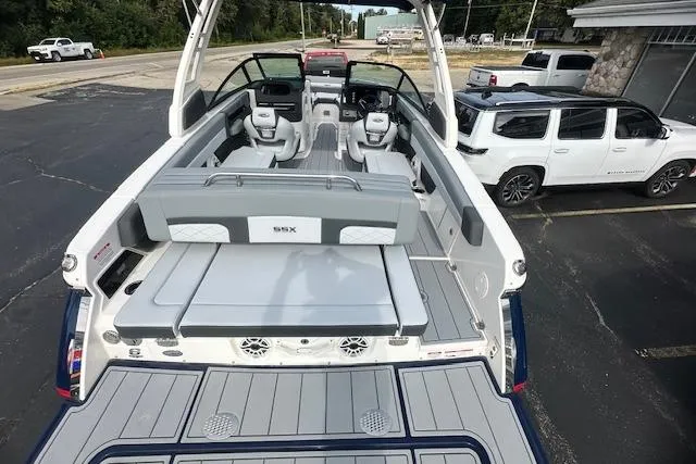 Slide: The Image of 2026 Chaparral 6 SSX boat interior with spacious seating and modern design. - 11