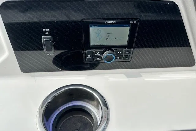 Slide: The Image of 2026 Chaparral 6 SSX dashboard with Clarion audio system and trim control. - 14