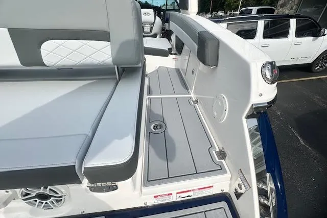 Slide: The Image of 2026 Chaparral 6 SSX boat interior with sleek seating and modern design. - 18