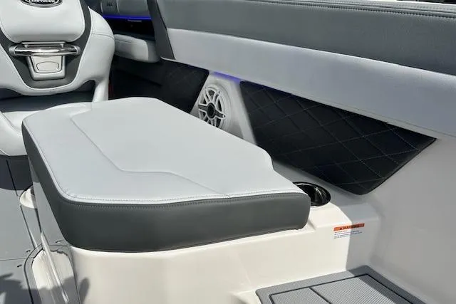 Slide: The Image of 2026 Chaparral 6 SSX boat interior with sleek seating and modern design elements. - 22