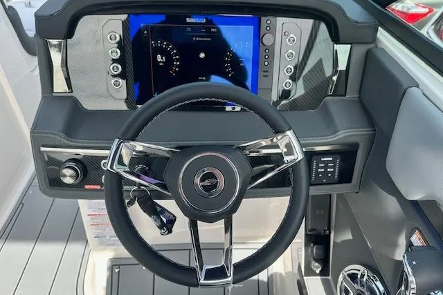 Slide: The Image of 2026 Chaparral 6 SSX dashboard with modern steering wheel and digital display. - 29