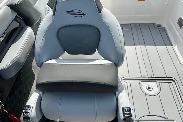 Slide: The Image of 2026 Chaparral 6 SSX boat interior with sleek seating and modern design. - 32
