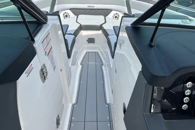 Slide: The Image of 2026 Chaparral 6 SSX boat interior with sleek seating and modern design. - 37
