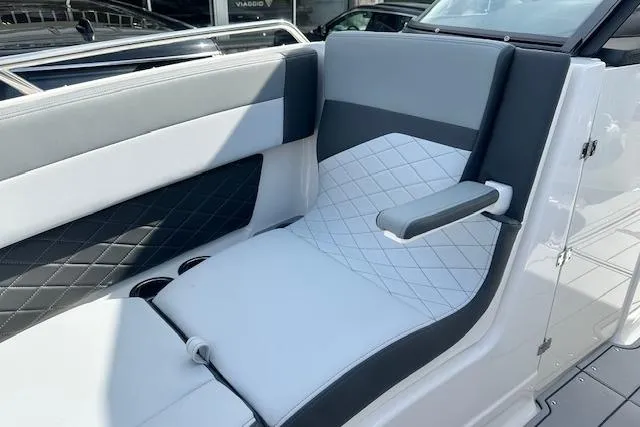 Slide: The Image of 2026 Chaparral 6 SSX boat interior with stylish gray and white seating. - 43