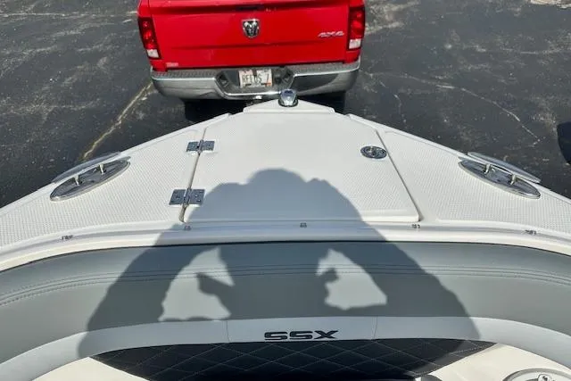 Slide: The Image of 2026 Chaparral 6 SSX boat bow with red truck in background. - 50