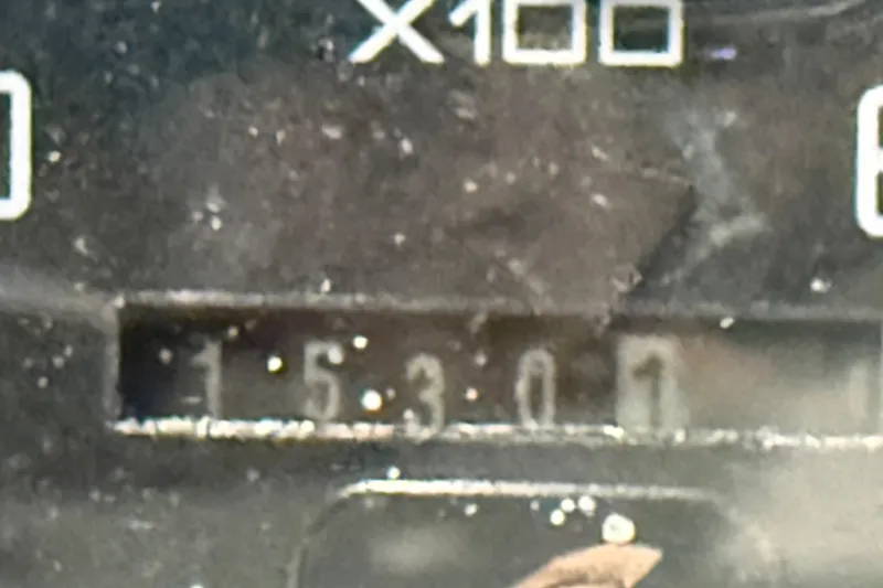 Slide: The Image of Close-up of a 1995 Sea Ray Sundancer 370 odometer reading 153.0 hours. - 26