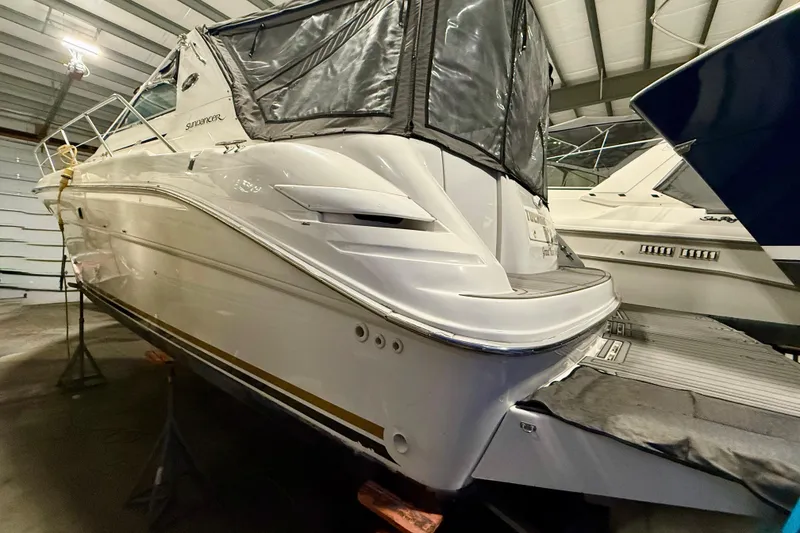 Slide: The Image of 1995 Sea Ray Sundancer 370 yacht in indoor storage, rear view. - 7