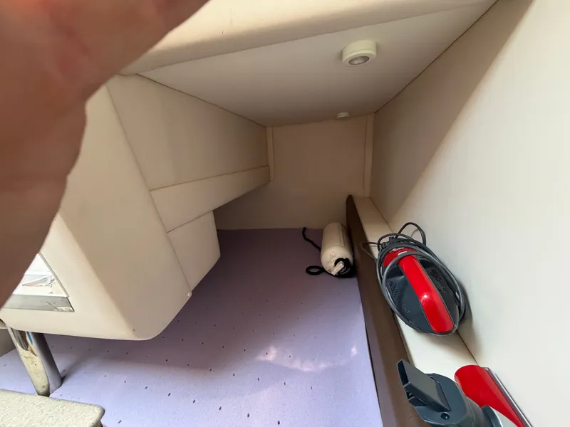 Slide: The Image of Interior of a 2014 Sea Ray Sundancer 260 boat with accessories. - 15