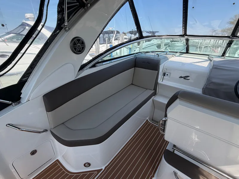 Slide: The Image of Interior of a 2014 Sea Ray Sundancer 260 with gray seating. - 9