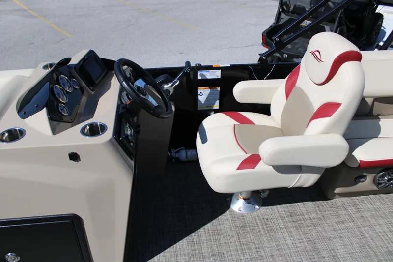 Slide: The Image of Captain's seat and dashboard of 2025 SunCatcher Select 20RC boat, featuring modern controls. - 15