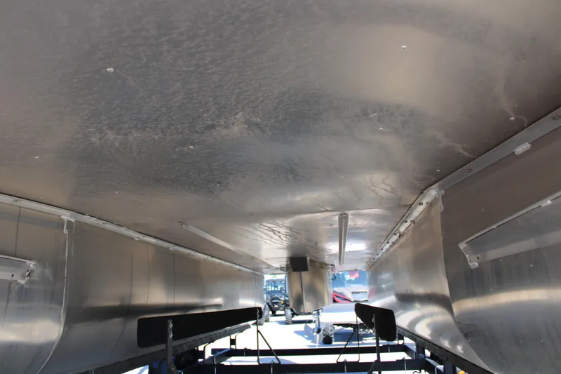 Slide: The Image of Underside view of 2025 SunCatcher Select 20RC pontoon boat on trailer. - 16