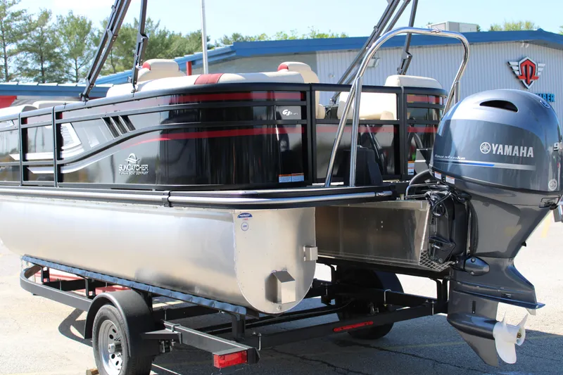 Slide: The Image of 2025 SunCatcher Select 20RC pontoon boat with Yamaha motor on trailer. - 5