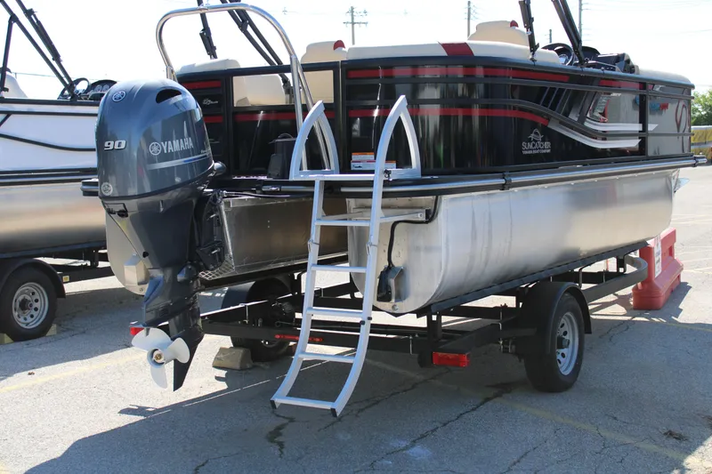 Slide: The Image of 2025 SunCatcher Select 20RC pontoon boat with Yamaha 90 engine on trailer. - 6