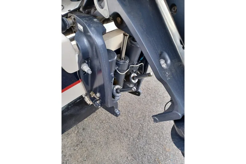 Slide: The Image of Close-up of 2013 Pursuit OS 255 Offshore boat engine components. - 23