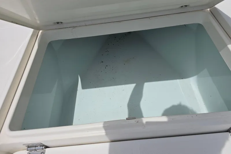 Slide: The Image of Open storage compartment on a 2015 Sea Born FX22 Bay boat. - 15