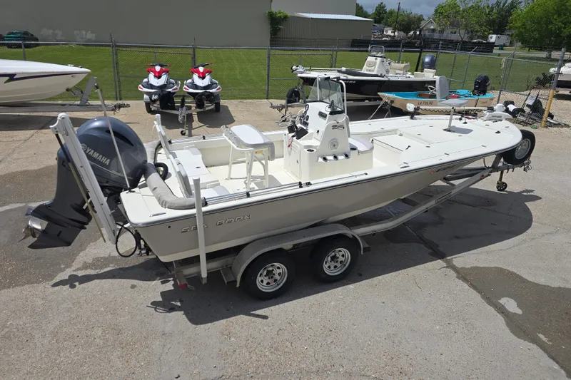 Slide: The Image of 2015 Sea Born FX22 Bay boat on trailer, equipped with Yamaha outboard motor. - 6