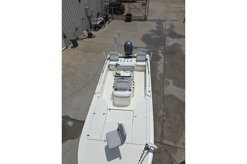 Slide: The Image of 2015 Sea Born FX22 Bay boat in a concrete yard, top view. - 9