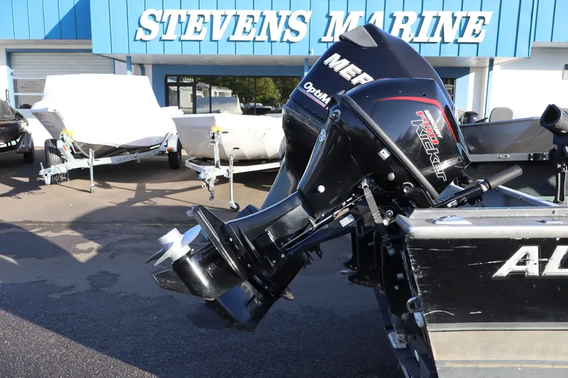 Slide: The Image of 1992 Alumaweld FV boat with Mercury outboard motor at Stevens Marine dealership. - 3