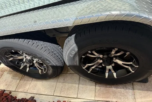 Slide: The Image of Bow of 2025 Sea Pro 240 Dual Console with anchor storage and rope. - 16