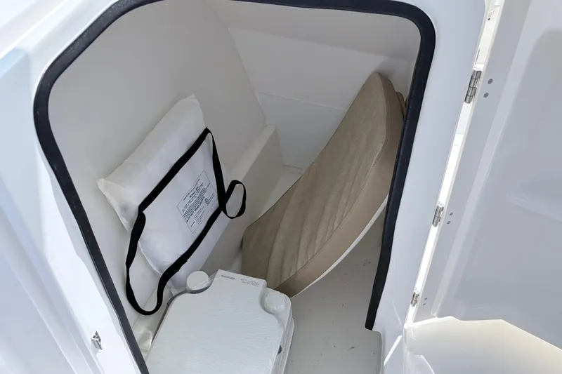 Slide: The Image of Interior storage compartment of 2025 Sea Pro 240 Dual Console boat. - 31