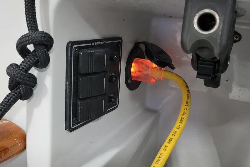 Slide: The Image of Electrical panel and power connection on a 2018 C.W. Hood 32 Daysailer. - 13