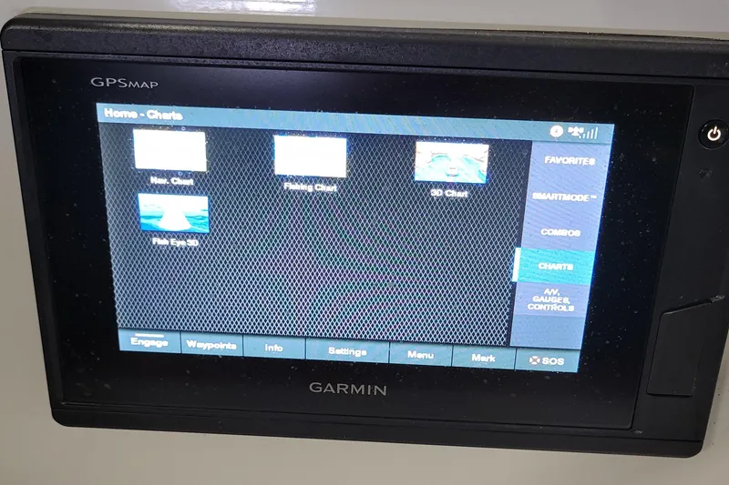 Slide: The Image of Garmin GPSMAP display on 2018 C.W. Hood 32 Daysailer, showing navigation charts and settings. - 14