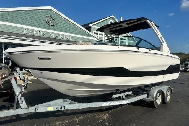 The Image of 2026 Chaparral 247 SSX boat on trailer at Reed's Marine dealership. - 0