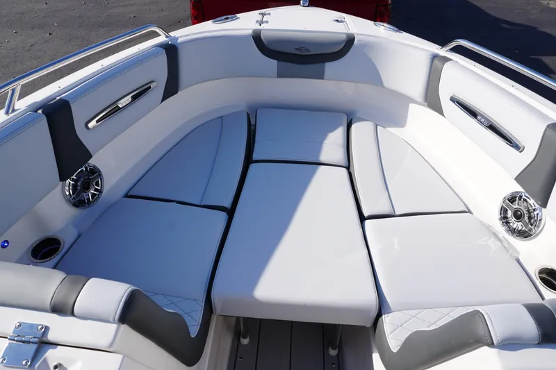 Slide: The Image of 2026 Chaparral 247 SSX boat interior with plush seating and modern design. - 18